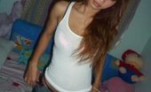 Thai Girls Wild Jang 204898 Long Hair Bright Eyed Barslut Strips And Poses On A Bed
