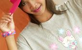 Tussinee Pink Promise 205821 Thai Cutie Posing Innocently In A Baseball Hat And Tee Shirt
