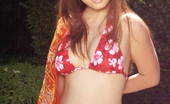 Wicked.com Fujiko Kano 215853 Sweet Asian Bimbo Fujiko Kano Poses In Flowered Bikini And Without It Outdoor
