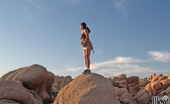 Wicked.com Devinn Lane 216030 The Big Titted Milf Devinn Lane Is Posing Half Naked And Naked On The Rocks
