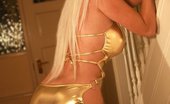 Saffron Taylor Goldengirl 219249 In A Sexy Gold Mini Dress
