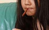 My Cute Asian 223926 Fetish Asian Babe Smoking A Cigar While Fingering Her Pussy

