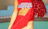My Cute Asian Asian In A Cheerleader Uniform Shows Her Tits And Shaved Pussy
