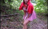 Amber Lily 228459 Little Red Riding Hood Shows Off Her Tiny Titties & White Panties In The Woods.
