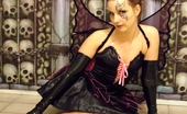 Amber Lily 228465 Tainted Housewife In Long Shiny Black Gloves & Naughty Fairy Wings.
