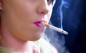 Smoking Videos Soniarothman120 This Slutty Babe Wears Lots Of Lipstick And Shows Her Tits While Smoking A Rothman 120 Cigarette
