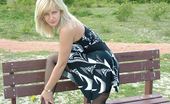 Stiletto Girl 230742 This Gorgeous Blonde Has Some Lacy Stockings Under Her Tiny Dress
