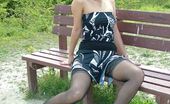 Stiletto Girl 230742 This Gorgeous Blonde Has Some Lacy Stockings Under Her Tiny Dress
