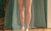 Stiletto Girl 230866 A Slender Brunette Wearing A Sexy Set Of High Heels
