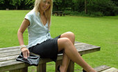 Stiletto Girl 230945 Hot Blonde Milf Jess Shows Her Shiny Black Heels And Stockings In Her Cheeky Short Office Skirt
