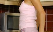 Only Melanie Melanie In The Kitchen Wearing A Pink Top And Skirt With Dark Pantyhose. (Non Nude)
