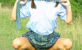 Only Melanie 234036 Melanie Takes A Wander In The Park Wearing A College Uniform Consisting Of Tartan Skirt
