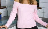 Only Melanie 234119 Melanie In A Pink Jumper And Black Miniskirt. (Non Nude)
