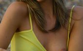 Only Melanie 234197 Melanie In A Tight Yellow Top And A White Miniskirt
