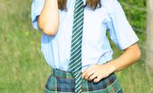Only Melanie 234231 Melanie Takes A Wander In The Park Wearing A College Uniform Consisting Of Tartan Skirt
