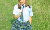 Only Melanie 234231 Melanie Takes A Wander In The Park Wearing A College Uniform Consisting Of Tartan Skirt
