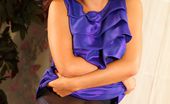 Only Silk And Satin India Reynolds 234404 India Looks Sparkling In Purple Evening Dress And Black Tights (Non Nude)
