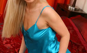 Only Silk And Satin Renata 234579 Renata In A Silk Gown With White Stockings. (Non Nude)
