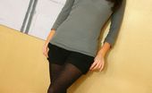 Only Carla 234874 Carla Looking Stunning In A Sexy Black Mini Skirt With Black Pantyhose And Boots. (Non Nude)
