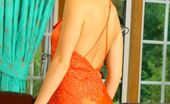 Only Carla 234907 Carla In A Stunning Orange Evening Dress
