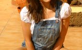 Only Carla 234914 Beautiful Brunette Carla Enjoys The Sun In A Casual Dungaree Minidress
