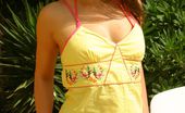 Only Carla 234927 Beautiful Brunette Carla Relaxes In The Sun In A Yellow Top And Pink Bikini. (Non Nude)
