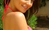 Only Carla 234927 Beautiful Brunette Carla Relaxes In The Sun In A Yellow Top And Pink Bikini. (Non Nude)
