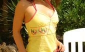 Only Carla Beautiful Brunette Carla Relaxes In The Sun In A Yellow Top And Pink Bikini. (Non Nude)
