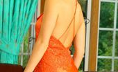 Only Carla 234952 Carla In A Stunning Orange Evening Dress (Non Nude)
