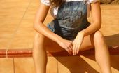 Only Carla 235105 Beautiful Brunette Carla Enjoys The Sun In A Casual Dungaree Minidress
