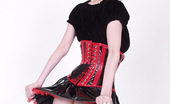 Gothic Sluts Szandora 236142 Spooky Busty Redhead In Red And Black Fetish Dress
