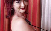 Gothic Sluts Genesis LaVey 236156 Goth Schoolmarm Spanks Her Puss With Riding Crop
