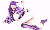 Gothic Sluts Szandora 236171 Purple Hair Girl In Striped Stockings Feather Boa
