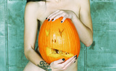 Gothic Sluts Jenny Trouble 236304 Classic Gothic Halloween Pin-Up Babe With Her Pumpkin
