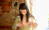 Nubiles Lolly Pop 239613 Lolly Pop Is So Horny As She Hides Behind The Wall And Caresses Her Pussy Lips
