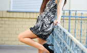 Nubiles Addison Dark 240008 Long Haired Brunette In Heels Flaunts Her Sexy Legs And Cute Cleavage Outdoors
