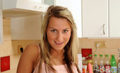 Nubiles Lexxis 241722 Leggy Hottie Lexxis Teasing With Her Short Skirt And Tiny Tops In The Kitchen
