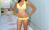 Nubiles Jazmin Ryder 242042 Black American Pinup Posing In Her Tiny Yellow Bikini At The Pool Walk Way
