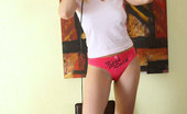 Nubiles Natisha 242167 Lovely Disc Jockey Natisha In Pink Panty Teasingly Posing With Her Sexy Legs
