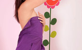Nubiles Poppy 242291 Charming Babe Poppy In Purple Dress Teases Us With Her Alluring Beauty
