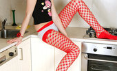 Nubiles Bala 242791 Sexy Coed Teen In Net Stockings Posing And Teasing In The Kitchen To Fill Our Sex Appetite
