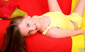 Nubiles Naney 243657 Cute Nubile Babe Naney In Yellow Outfit Teases Us With Her Beauty On The Couch
