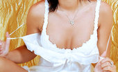 Nubiles Kinzie 243741 Sweet Hot Babe Kinzie Gets Topless To Show Her Juicy Tits While Relaxing On The Sofa
