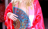 Nubiles Jess 246949 Alluring Blonde Teen Posing Her Fuckable Body With A Nice Red Kimono Dress
