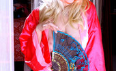 Nubiles Jess 246949 Alluring Blonde Teen Posing Her Fuckable Body With A Nice Red Kimono Dress
