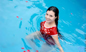 Nubiles Florencia 247412 Alluring Teen Enjoys Swimming And Teasing With A Red Roses Petals On Pool
