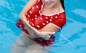 Nubiles Florencia 247412 Alluring Teen Enjoys Swimming And Teasing With A Red Roses Petals On Pool
