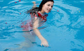 Nubiles Florencia 247412 Alluring Teen Enjoys Swimming And Teasing With A Red Roses Petals On Pool
