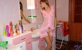 Nubiles Katrina Amateur Cutie In Sheer Pink Gown And Thongs Looking Beautiful And Charming
