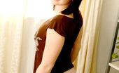 Nubiles Camille 247700 Lovely Camille Standing Besides Window Alluring With A Cute Smile
